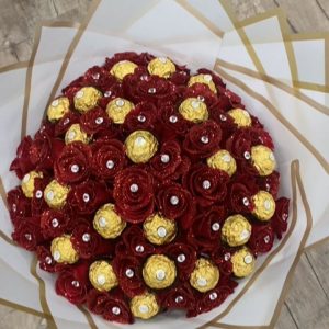 Buque Ferrero — 50 Rosas con 48 Chocolates y Diamantina