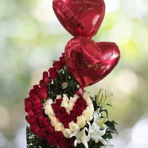 Happy Anniversary Deluxe arrangement with two personalized heart-shaped designs