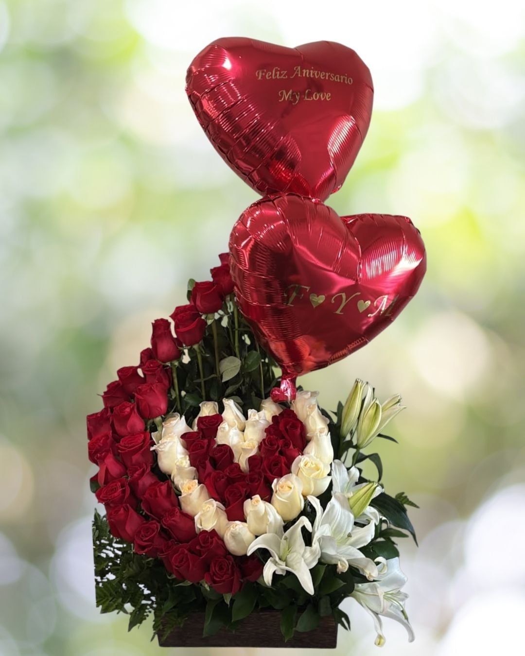 Happy Anniversary Deluxe arrangement with two personalized heart-shaped designs