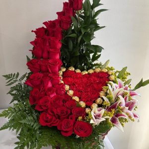 Remember Me cascading bouquet with roses, oriental lilies, and heart-shaped chocolates